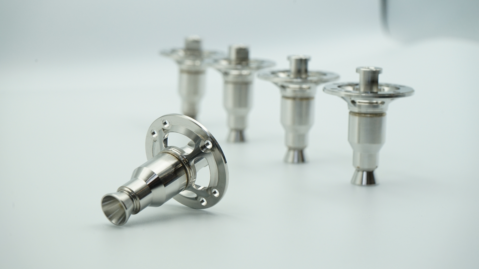 A batch of serialised thrusters lined up after machining